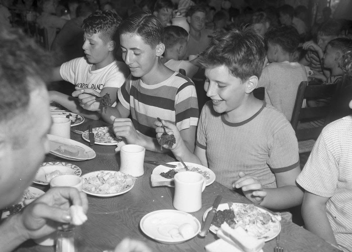 July 26, 1944: Hirschel Kershman, left, son of Mrs. Bessie Kershman; Gilbert Friedson, son of Mr. and Mrs. Ernest Friedson, and Teddy Hendelman, son of Mr. and Mrs. Morris Hendelman, are liking their spinach at Worth Ranch Boy Scout camp. Fort Worth Star-Telegram archive/UT Arlington Special Collections