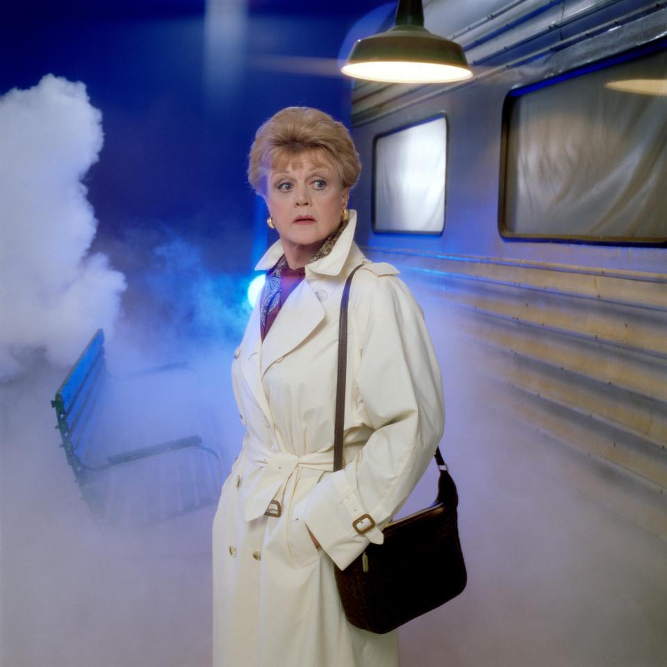 Angela Lansbury in a trench coat