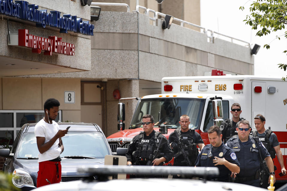 <p>Capitol Hill Police leave the emergency entrance at MedStar Washington Hospital Center in Washington, Wednesday, June 14, 2017, where House Majority Leader Steve Scalise of La. was taken after being shot in Alexandria, Va., during a Congressional baseball practice. (Photo: Jacquelyn Martin/AP) </p>