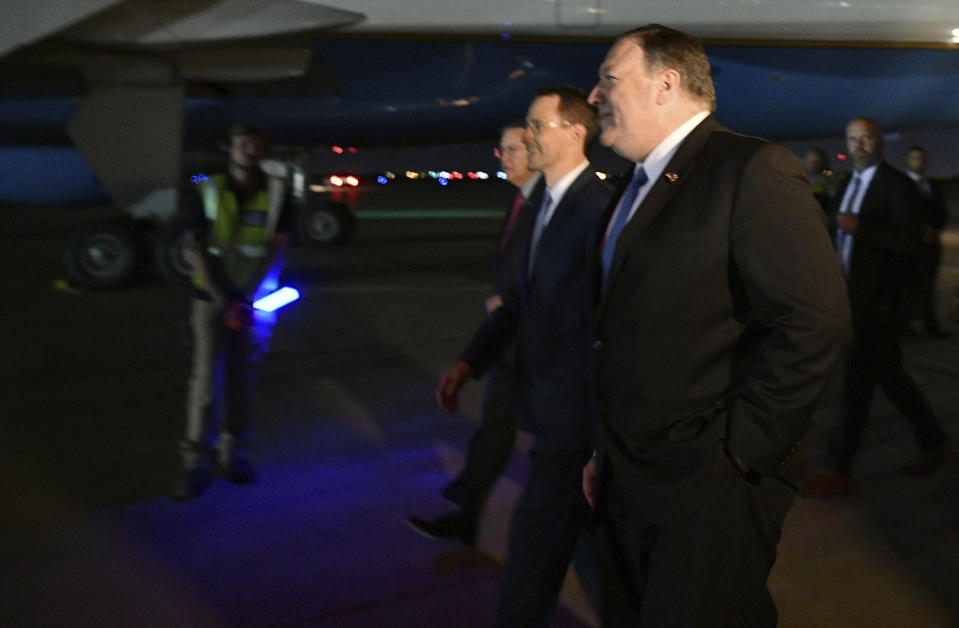 U.S. Secretary of State Mike Pompeo, right, walks with Acting Assistant Secretary for Near Eastern Affairs at the State Department David Satterfield and Charge D'affaires at the U.S. Embassy in Baghdad Joey Hood, second from right, after arrivng in Baghdad for meetings Tuesday, May 7, 2019. (Mandel Ngan/Pool Photo via AP)