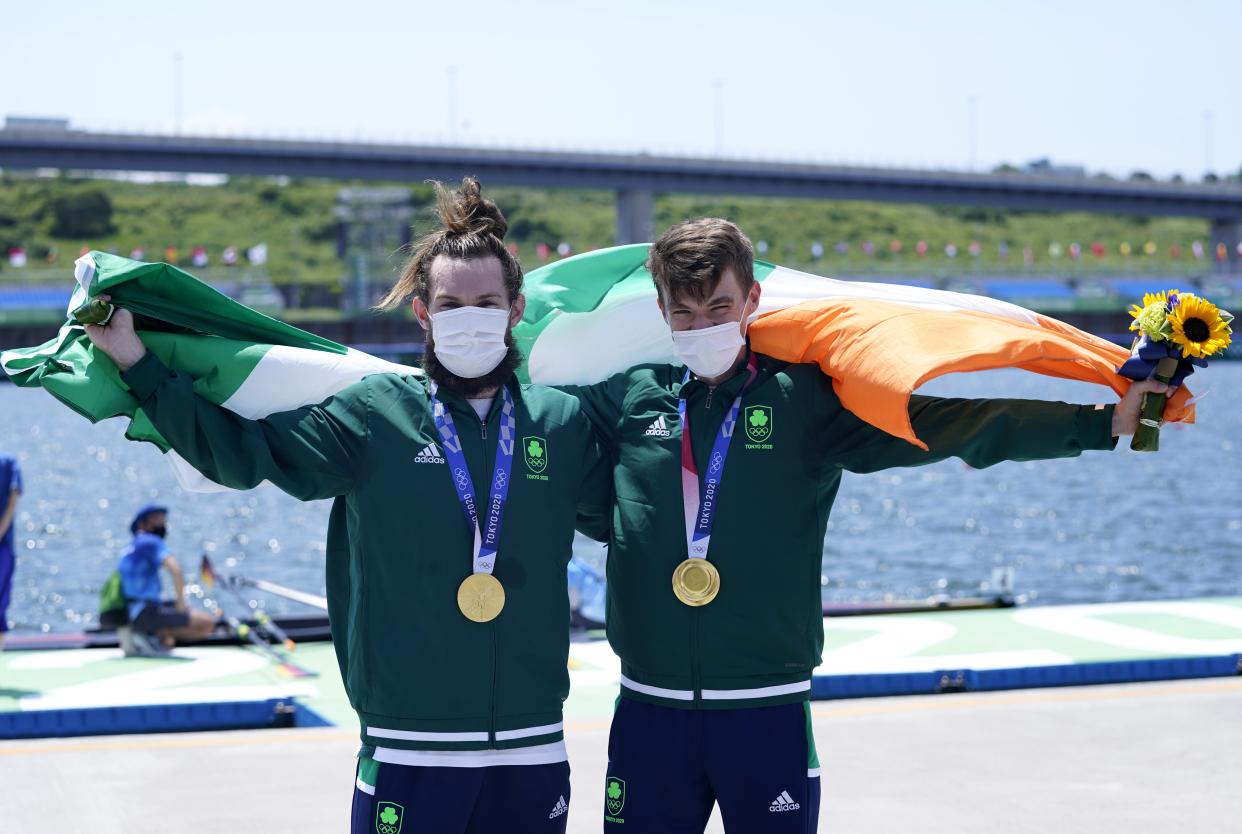 Ireland’s Paul O’Donovan and Fintan McCarthy with their gold medals after winning the lightweight double sculls (Danny Lawson/PA) (PA Wire)