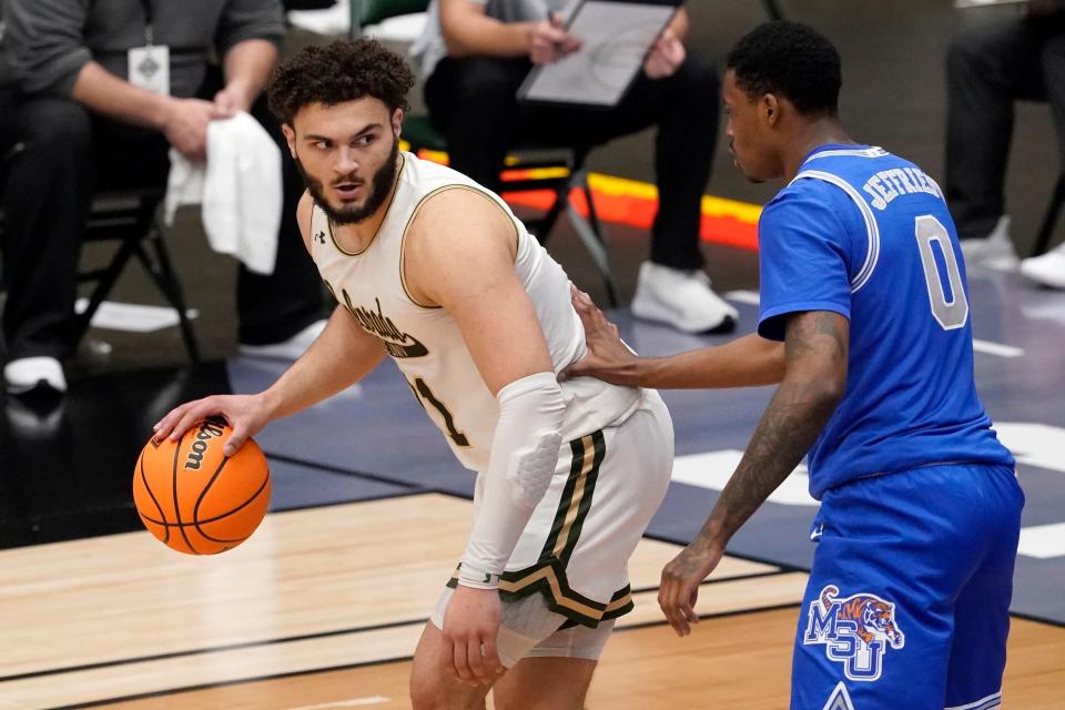 Colorado State guard David Roddy (21) works against Memphis forward D.J. Jeffries (0) for a shot opportunity in the second half of an NCAA college basketball game in the semifinals of the NIT, Saturday, March 27, 2021, in Frisco, Texas. (AP Photo/Tony Gutierrez)