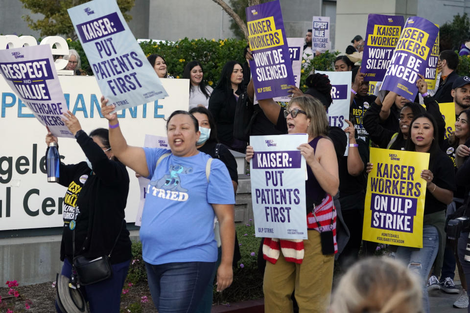 Kaiser Permanente healthcare workers rally outside Kaiser Permanente Los Angeles Medical Center in Los Angeles on Wednesday, Oct. 4, 2023. Some 75,000 Kaiser Permanente hospital employees who say understaffing is hurting patient care walked off the job Wednesday in five states and the District of Columbia, kicking off a major health care worker strike. (AP Photo/Damian Dovarganes)