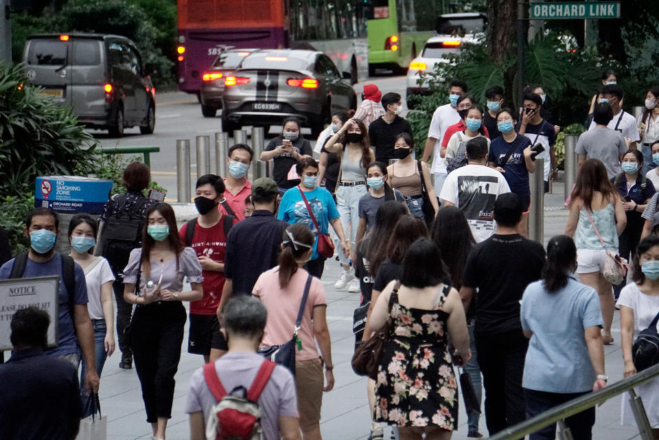 People in face masks seen along Orchard Road on 19 June 2020, the first day of Phase 2 of Singapore’s re-opening. (PHOTO: Dhany Osman / Yahoo News Singapore)