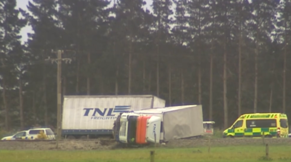 The truck on its side following the crash. Source: 1News