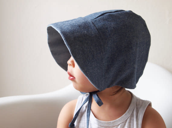 Get it on <a href="https://www.etsy.com/listing/514649429/baby-bonnet-chambray-toddler-bonnet-baby?ga_order=most_relevant&amp;ga_search_type=all&amp;ga_view_type=gallery&amp;ga_search_query=sun%20hats%20for%20babies&amp;ref=sr_gallery-1-25" target="_blank">Etsy</a>, $26.