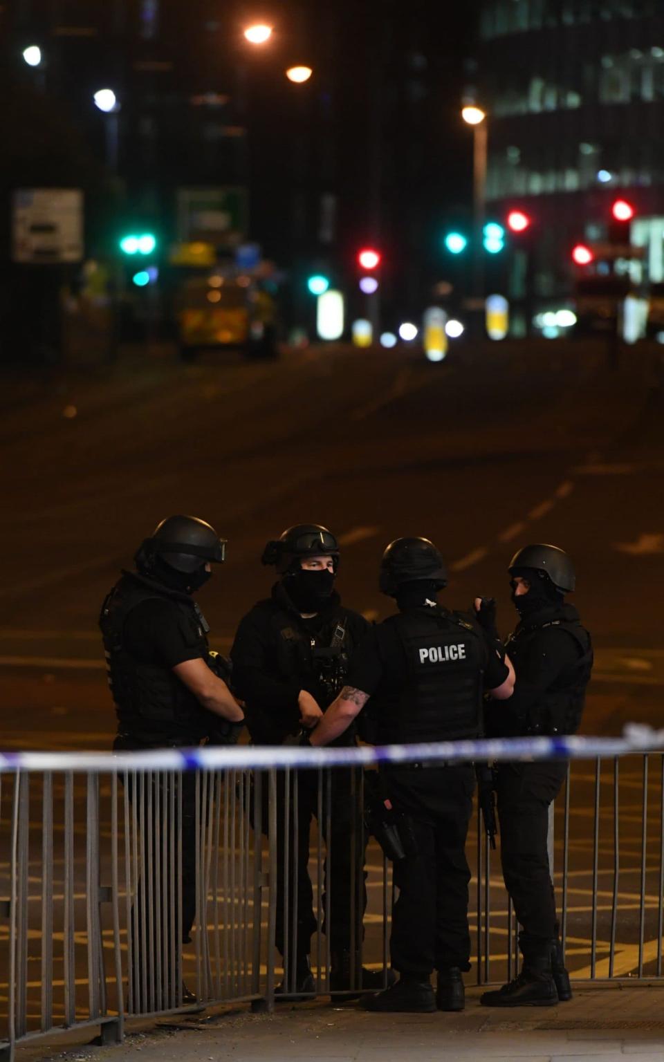 Armed police stand guard at the scene of the suspected terrorist attack - Credit: AFP