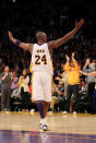 Lakers guard Kobe Bryant celebrates with the fans during the second overtime period against the Oklahoma City Thunder on April 22 in Los Angeles. (Photo by Stephen Dunn/Getty Images)