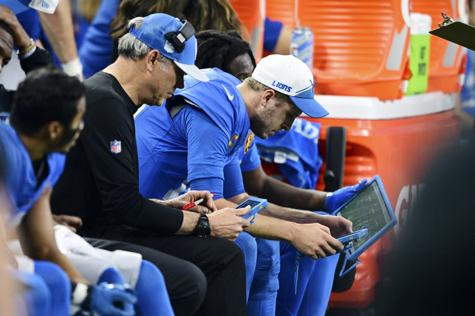 Detroit Lions quarterback Jared Goff looks over plays during the second half of an NFL football game against the Green Bay Packers, Thursday, Nov. 23, 2023, in Detroit. (AP Photo/David Dermer)