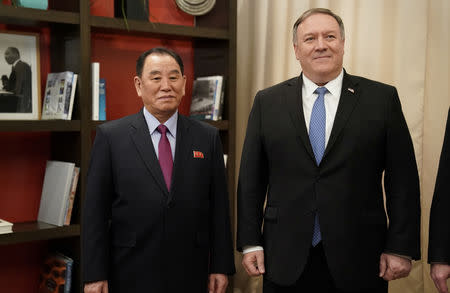 U.S. Secretary of State Mike Pompeo poses with Vice Chairman of the North Korean Workers' Party Committee Kim Yong Chol, North Korea's lead negotiator in nuclear diplomacy with the United States, for talks aimed at clearing the way for a second U.S.-North Korea summit as they meet at a hotel in Washington, U.S., January 18, 2019. REUTERS/Joshua Roberts