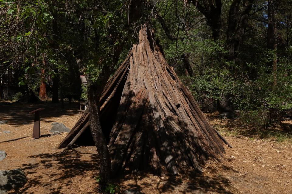 The site of a former Miwok village in Yosemite Valley is now an outdoor museum display of traditional shelters. Thomas S. Bremer, <a href="http://creativecommons.org/licenses/by-nd/4.0/" rel="nofollow noopener" target="_blank" data-ylk="slk:CC BY-ND;elm:context_link;itc:0;sec:content-canvas" class="link ">CC BY-ND</a>