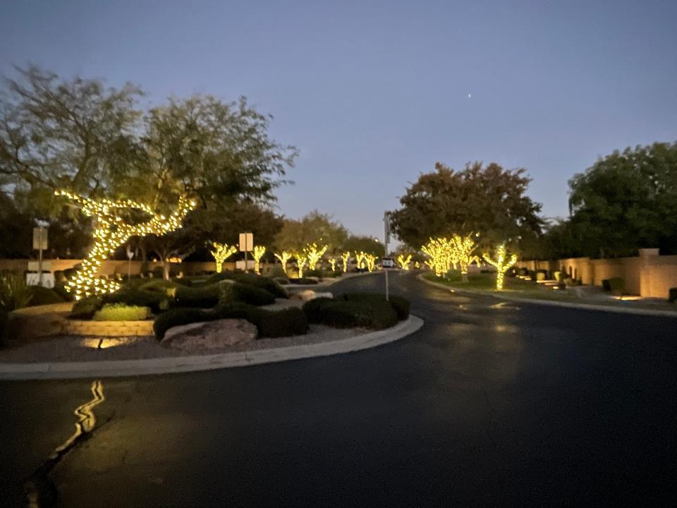 The road leading into the gated Gilbert community Whitewing on Nov. 22, 2023. Several weeks earlier, as part of the investigation into Preston Lord's death, police executed four search warrants in the neighborhood near Higley and Pecos roads.