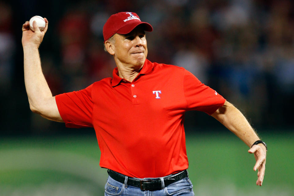 ARLINGTON, TX - OCTOBER 24: Dallas Cowboys Hall of Fame quarterback Roger Staubach throws out the ceremonial first pitch prior to Game Five of the MLB World Series between the St. Louis Cardinals and the Texas Rangers at Rangers Ballpark in Arlington on October 24, 2011 in Arlington, Texas. (Photo by Tom Pennington/Getty Images)