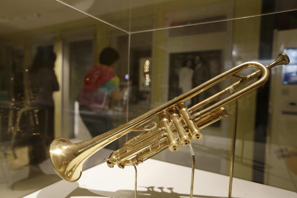 A trumpet belonging to Louis Armstrong is on display for patrons at the Louis Armstrong House Museum Wednesday, Oct. 9, 2013, in the Queens borough of New York. The Selmer Trumpet was a gift from King George V in 1933. (AP Photo/Frank Franklin II)