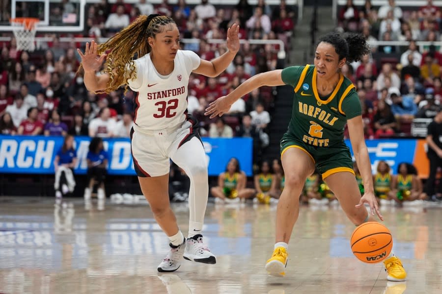 Norfolk State guard Niya Fields, right, moves the ball while defended by Stanford guard Jzaniya Harriel during the first half of a first-round college basketball game in the women’s NCAA Tournament in Stanford, Calif., Friday, March 22, 2024. (AP Photo/Godofredo A. Vásquez)