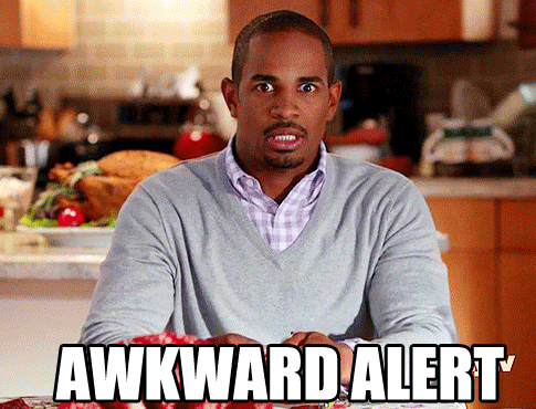 Damon Wayans Jr. making a surprised and awkward face, sitting at a kitchen table, with "AWKWARD ALERT" in large text at the bottom of the image