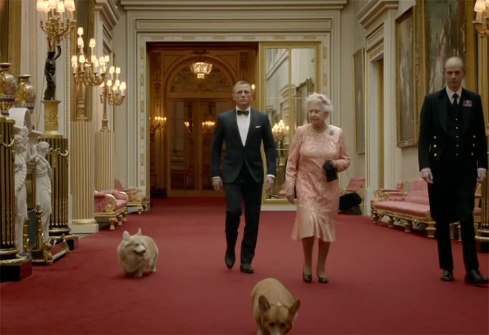 Queen Elizabeth II, accompanied by James Bond (Daniel Craig) and her Corgis, depart for the opening ceremonies of the 2012 London Olympic Games. / Credit: Olympics/YouTube