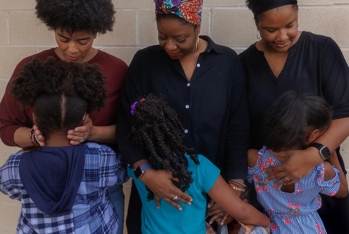 Mothers Anna Sneed, Chantel Jones-Bigby and Sharby Hunt-Hart with their daughters at the Rowlett Public Library in Rowlett, TX on October 26, 2023.