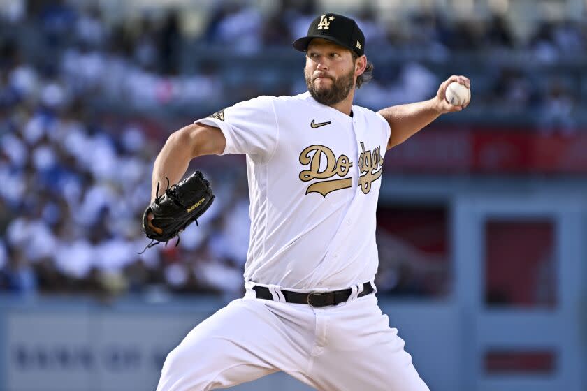 National League pitchers Clayton Kershaw, of the Los Angeles Dodgers, delivers a pitch