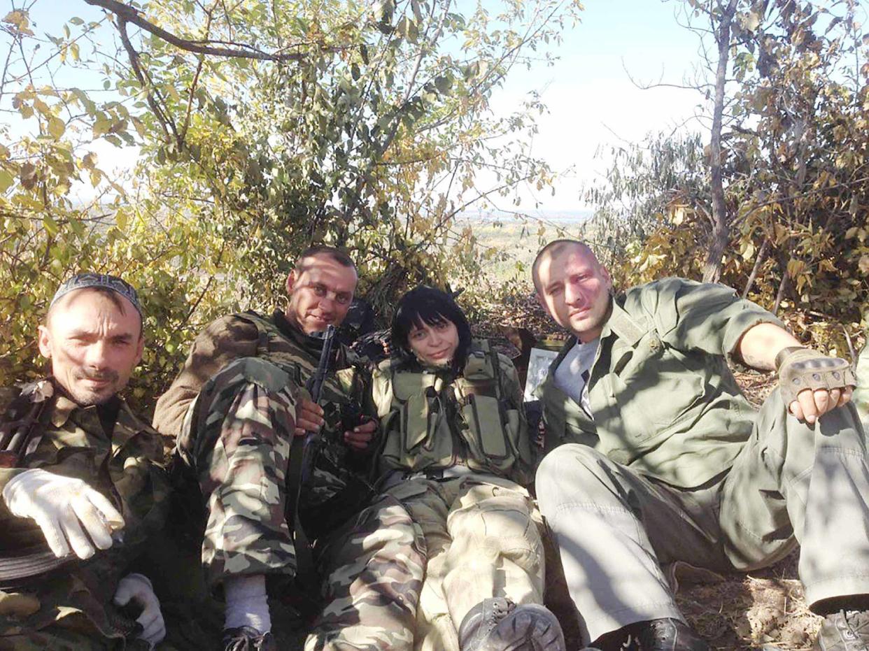Sniper Irina Starikova (second right) with her husband Alexaner Ogrenich (second left) 