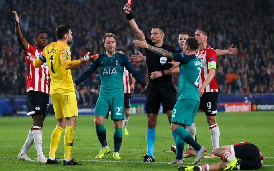 Hugo Lloris is sent off for Spurs shortly before PSV equalised at the Philips Stadion - AP