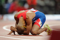 LONDON, ENGLAND - AUGUST 06: Felix Sanchez of Dominican Republic celebrates after winning the gold medal in the Men's 400m Hurdles final on Day 10 of the London 2012 Olympic Games at the Olympic Stadium on August 6, 2012 in London, England. (Photo by Michael Regan/Getty Images)