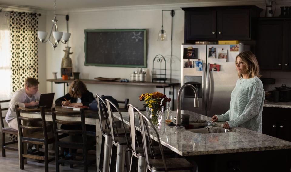 Casondra "Cassi" Pollreis and her sons, Weston Young and Haden Young, at home in Springdale, Ark.