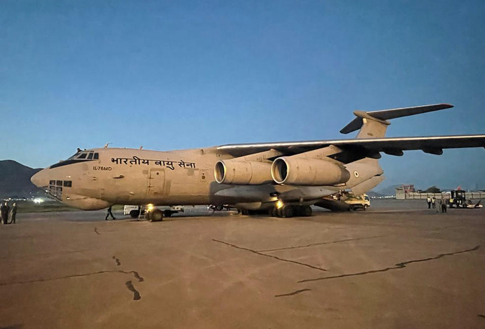 An Indian Air Force aircraft with earthquake relief consignment lands in Kabul, Afghanistan, Thursday, June 23, 2022. India said it sent a technical team to Kabul to coordinate the delivery of humanitarian assistance after a powerful earthquake in eastern Afghanistan that state media reported killed 1,000 people. (India's Ministry of External Affairs via AP)