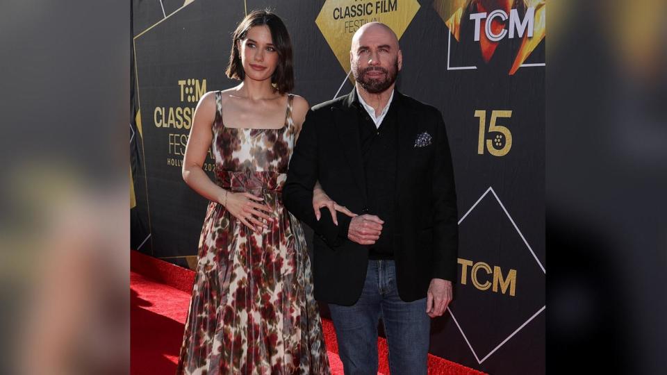 PHOTO: Cast member John Travolta and his daughter Ella Bleu Travolta attend a screening for the 30th anniversary of the movie 'Pulp Fiction' in Los Angeles, Apr. 18, 2024.  (Mario Anzuoni/Reuters)