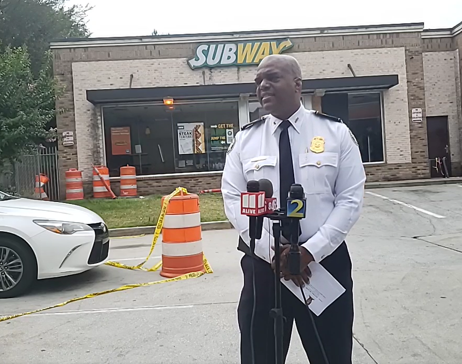 Atlanta Police Department Deputy Chief Charles Hampton Jr. speaks during a news conference on July 27, 2022 after a Subway employee was fatally shot after an argument with a customer "about too much mayo" on a sandwich.