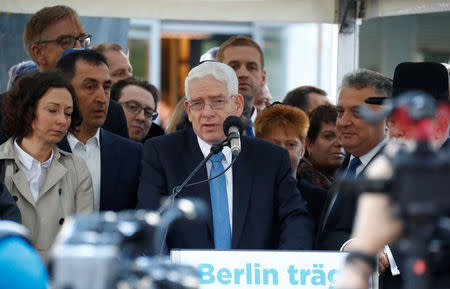 President of the Centra Council of Jews in Germany, Josef Schuster, speaks during a demonstration in front of a Jewish synagogue, to denounce an anti-Semitic attack on a young man wearing a kippa in the capital earlier this month, in Berlin, Germany, April 25, 2018. REUTERS/Fabrizio Bensch