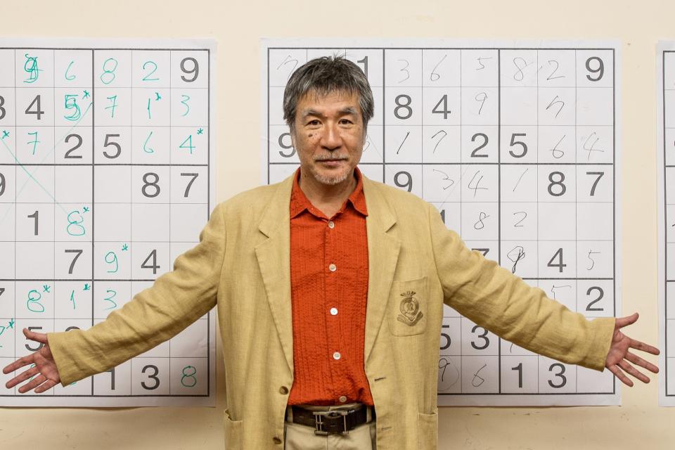 Japanese puzzle manufacturer Maki Kaji poses for a picture during the Sudoku first national competition in Sao Paulo, Brazil, on September 29, 2012.