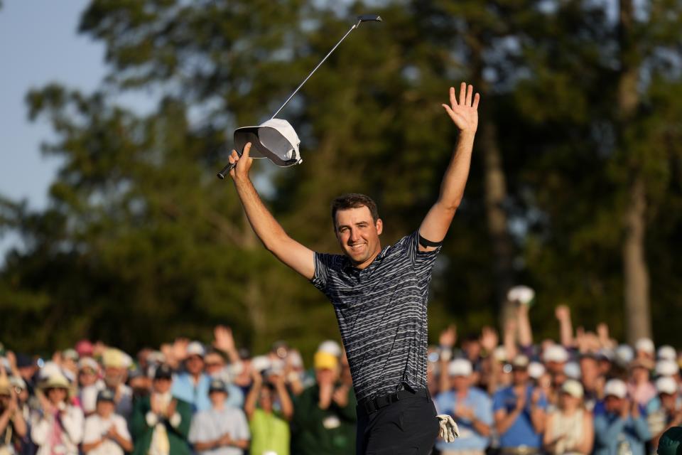 Scottie Scheffler celebrates after winning the 86th Masters golf tournament on Sunday, April 10, 2022, in Augusta, Ga. (AP Photo/Matt Slocum)