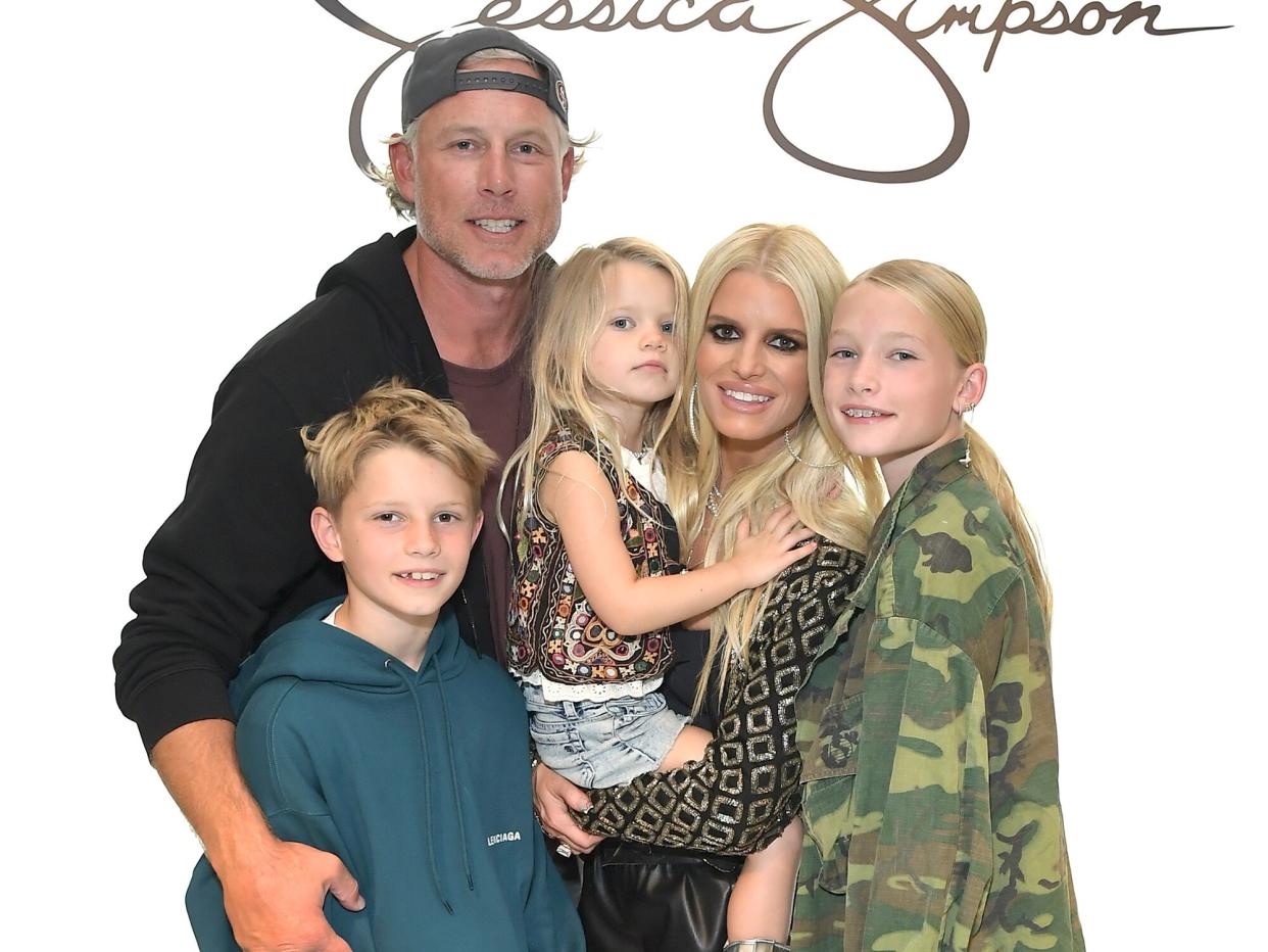 Ace Knute Johnson, Eric Johnson, Birdie Mae Johnson, Jessica Simpson, and Maxwell Drew Johnson celebrate the launch of Jessica Simpson's Fall Collection with fans and a special performance by the LA Roller Girls at Nordstrom at The Grove on September 24, 2022 in Los Angeles, California
