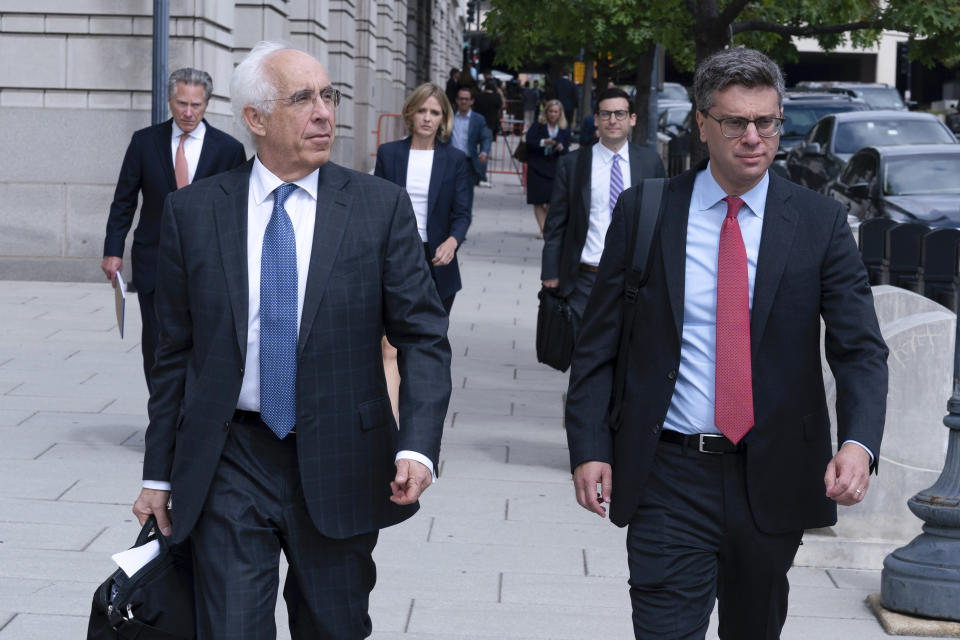 TikTok Attorney Andrew Pincus, left, accompanied by his team, leaves the federal courthouse in Washington, Monday, Sept. 16, 2024, after a hearing on TikTok's lawsuit against the federal government. (AP Photo/Jose Luis Magana)