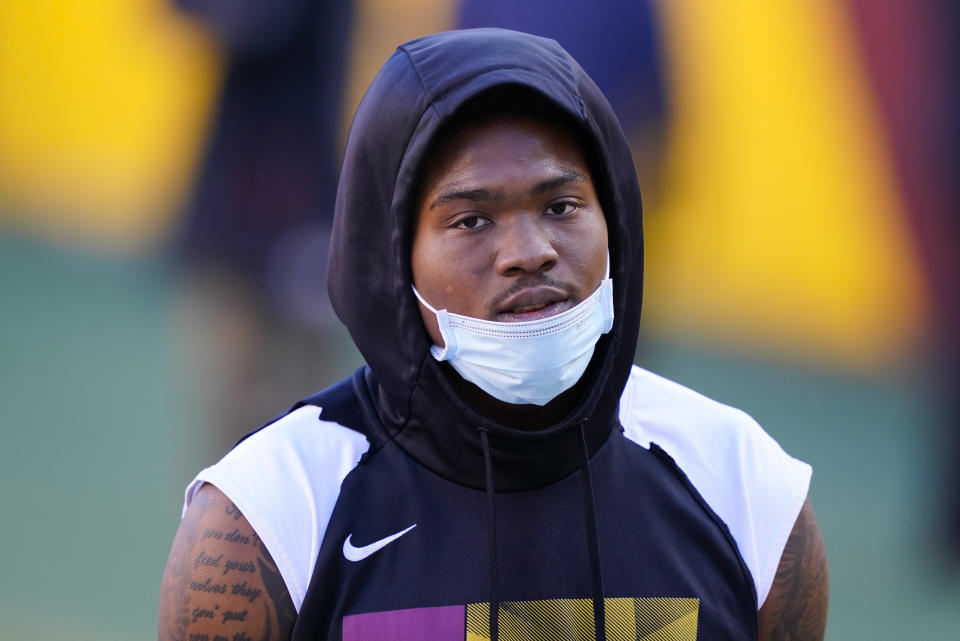 Washington Football Team quarterback Dwayne Haskins (7) walking on the field before the start of an NFL football game against the Carolina Panthers, Sunday, Dec. 27, 2020, in Landover, Md. (AP Photo/Susan Walsh)