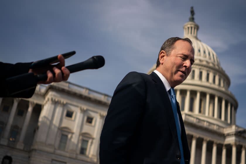 WASHINGTON, DC - JANUARY 12: Rep. Adam Schiff (D-CA) speaks with a reporter as departs the House of Representatives following votes at the U.S. Capitol on Thursday, Jan. 12, 2023 in Washington, DC. (Kent Nishimura / Los Angeles Times)