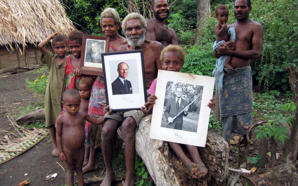 Chief Jack Naiva (with beard) and some of his tribe members, who worship the Duke of Edinburgh as a God - Richard Shears/Rex Features