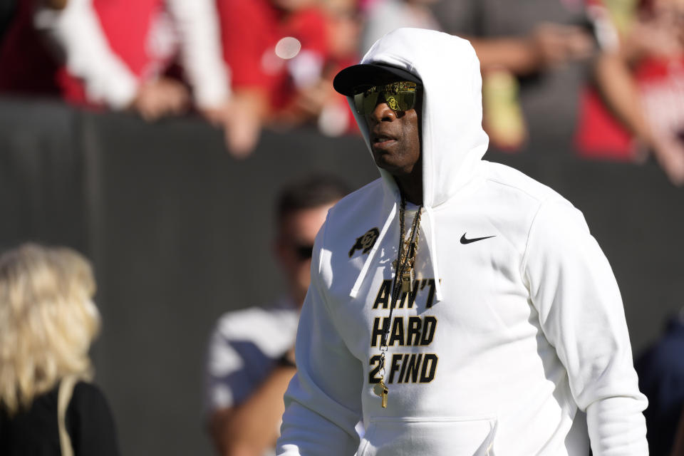 Colorado head coach Deion Sanders walks the perimeter of Folsom Field before an NCAA college football game against Nebraska Saturday, Sept. 9, 2023, in Boulder, Colo. (AP Photo/David Zalubowski)