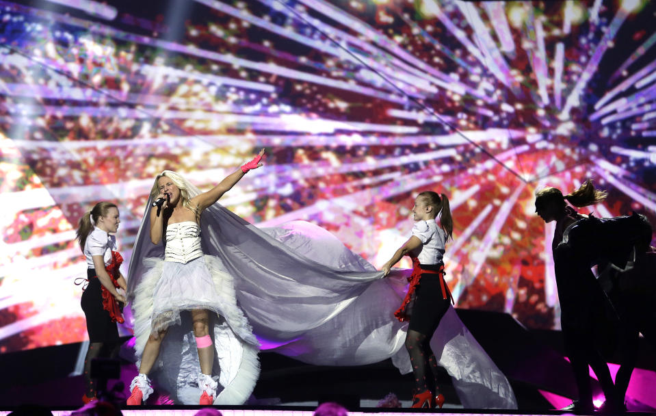 FILE - Krista Siegfrids of Finland performs her song "Marry Me" during a rehearsal for the final of the Eurovision Song Contest at the Malmo Arena in Malmo, Sweden, May 17, 2013. The 68th Eurovision Song Contest is taking place in May in Malmö, Sweden. It will see acts from 37 countries vie for the continent’s pop crown. Founded in 1956, Eurovision is a feelgood extravaganza that strives to banish international strife and division. It’s known for songs that range from anthemic to extremely silly, often with elaborate costumes and spectacular staging. (AP Photo/Alastair Grant, File)