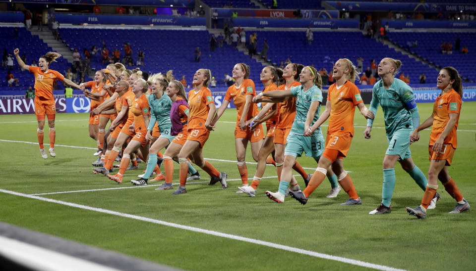 Netherlands players celebrate after defeating Sweden 1-0 to win their Women's World Cup semifinal soccer match at Stade de Lyon outside Lyon, France, Wednesday, July 3, 2019. (AP Photo/Alessandra Tarantino)