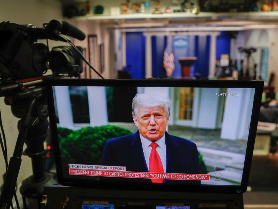 Donald Trump delivers video message distancing himself from events of 6 January 2021 (EPA)