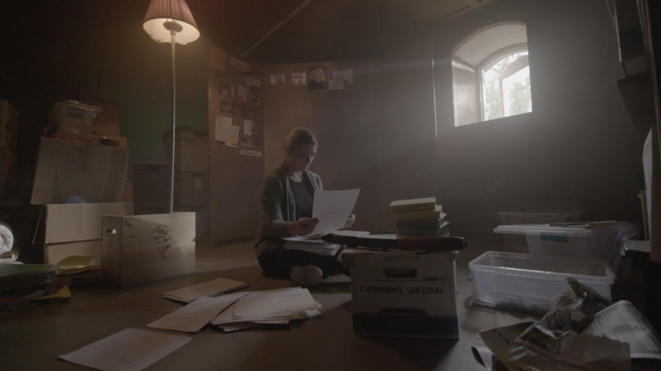 Producer Jenna Jackson in her attic, going through the files on Catherine Shelton. / Credit: P+R Creative Group