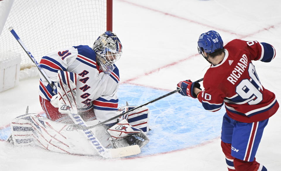 Montreal Canadiens' Anthony Richard (90) is stopped by New York Rangers goaltender Igor Shesterkin, left, during third-period NHL hockey game action in Montreal, Thursday, March 9, 2023. (Graham Hughes/The Canadian Press via AP)