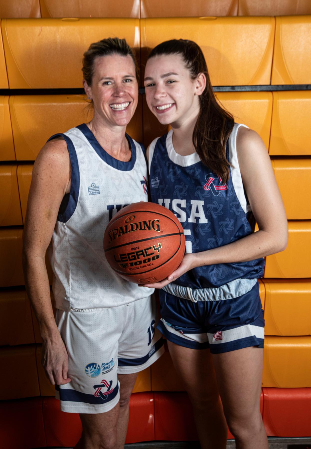Caroline Dorfman of Mamaroneck and her daughter Addison, 15, both won medals in basketball at the Maccabi Pan-Am Games in Argentina over the holidays. Caroline played on the USA open team, and Addison played on the USA U18 team. When countries pulled out over security concerns, Addison's team was forced to play against adult teams, including playing against her mother. They were photographed at Mamaroneck High School Jan. 15, 2024.