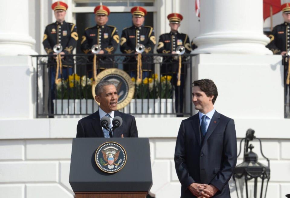 Canadian Prime Minister Justin Trudeau, right, listens as U.S. President Barack Obama speaks at a state arrival ceremony on the South Lawn of the White House in Washington, D.C., on Thursday, March 10, 2016. THE CANADIAN PRESS/Paul Chiasson