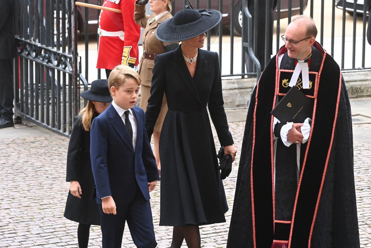 Britain's Princess Charlotte of Wales (L), Britain's Prince George of Wales (2nd L) and Britain's Catherine, Princess of Wales (2nd R) arrives at Westminster Abbey in London on September 19, 2022, for the State Funeral Service for Britain's Queen Elizabeth II. (Photo by Geoff PUGH / POOL / AFP) (Photo by GEOFF PUGH/POOL/AFP via Getty Images)