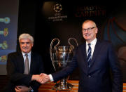 Club Atletico de Madrid Manager Clemente Villaverde (L) shakes hands with Andrew Neville, Football Operations Director of Leicester City FC, after the draw of the UEFA Champions League quarterfinals in Nyon, Switzerland March 17, 2017. REUTERS/Denis Balibouse