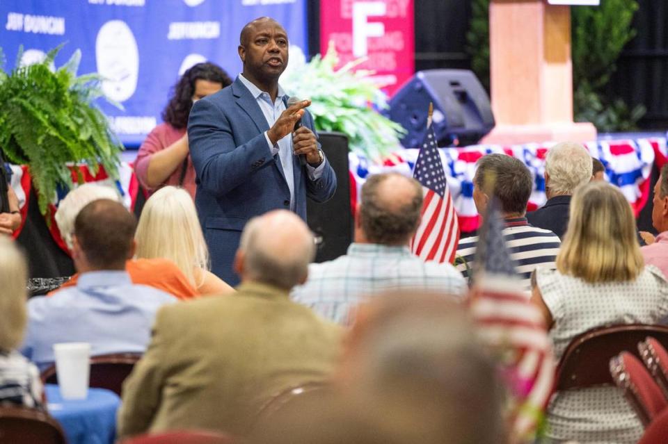 Senator and Republican presidential candidate Tim Scott speaks to the annual Faith and Freedom Barbecue on Monday, August 28, 2023. In his speech, Scott jumped off stage and spoke about border control, faith and his political philosophy.