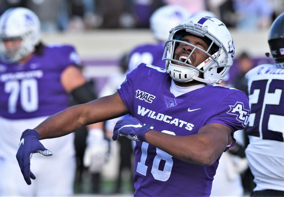 ACU's Kendall Catalon celebrates after catching a 4-yard TD pass from Maverick McIvor to break a 7-7 tie with 9:46 left in the third quarter against SFA. The Lumberjacks beat ACU 24-21 for the Western Athletic Conference title Saturday, Nov. 19, 2022, at Wildcat Stadium.